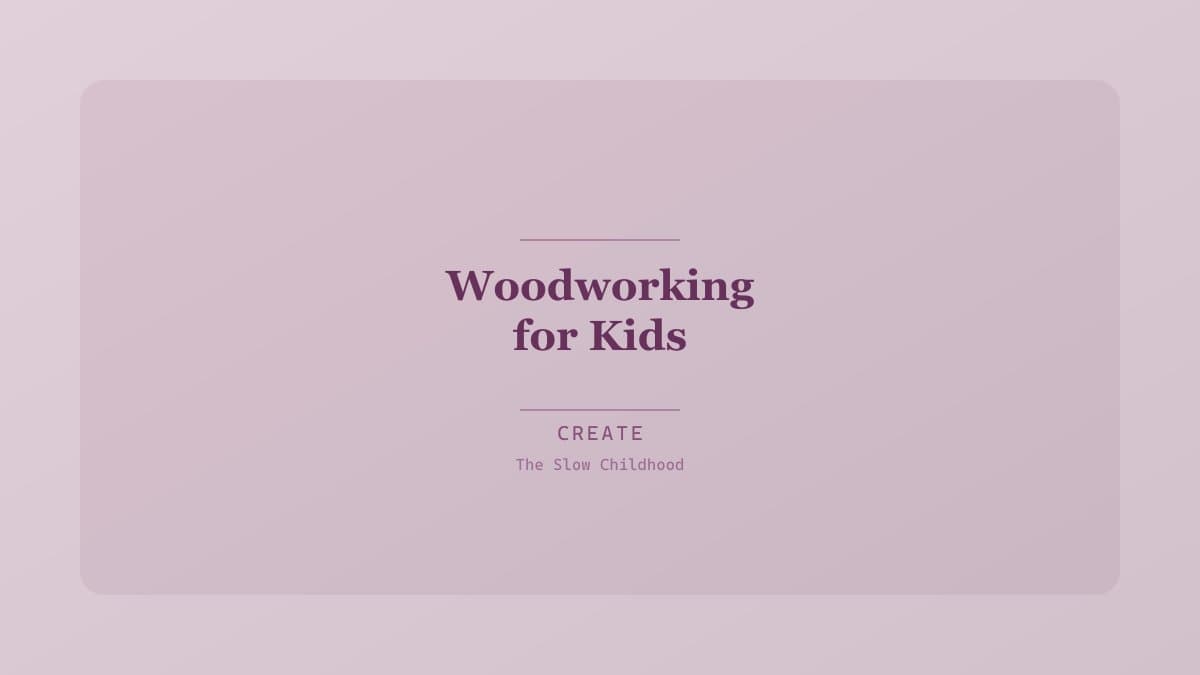 Child hammering a nail into a piece of wood at an outdoor workbench with safety goggles on